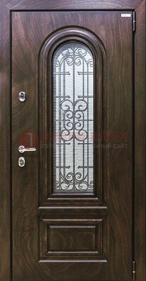 Темная филенчатая железная дверь со стеклом и ковкой ДСК-102 в Электрогорске