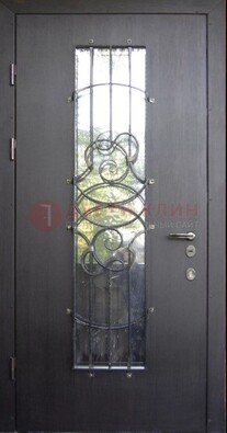 Остекленная стальная дверь с ковкой ДСК-26 в Электрогорске
