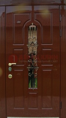 Красивая металлическая дверь со стеклом и ковкой ДСК-33 в Электрогорске