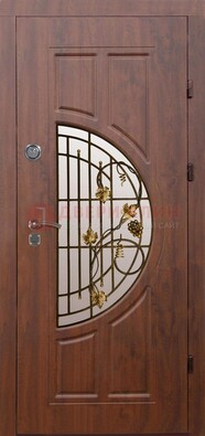 Стальная коричневая дверь с виноритом и ковкой ДВТ-82 в Электрогорске